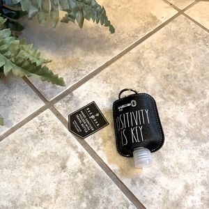 Hand sanitizer holder